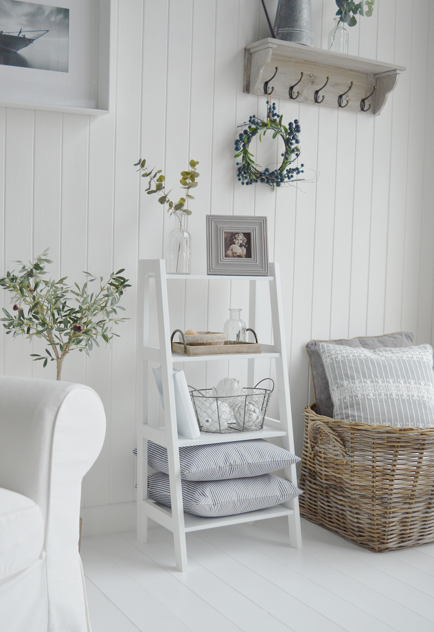 The Patten white shelf unit with four shelves for living room furniture in New England country, coastal and city home interiors