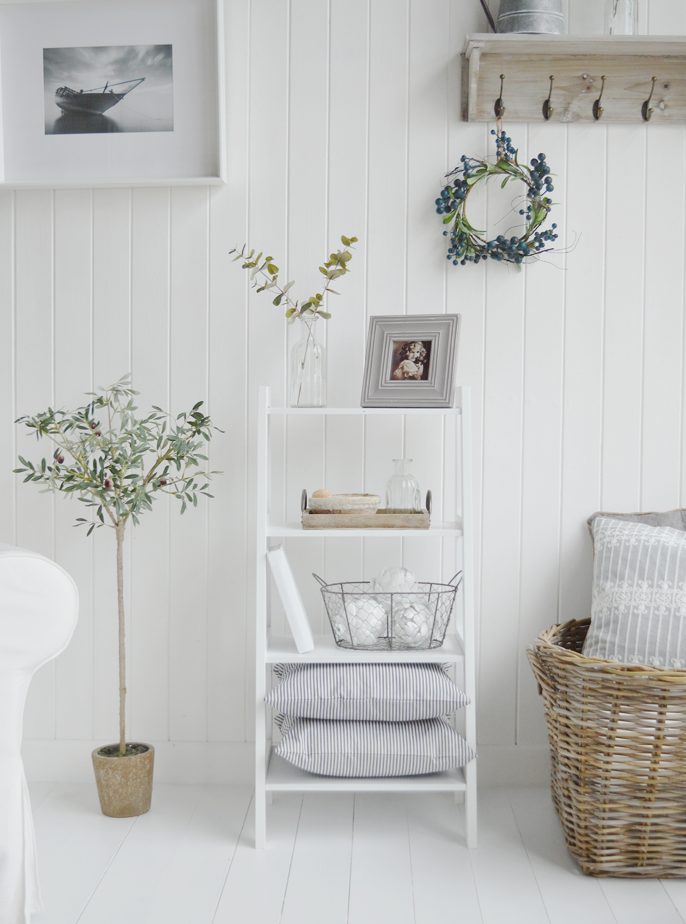 The Patten white shelf unit with four shelves for living room furniture in New England country, coastal and city home interiors