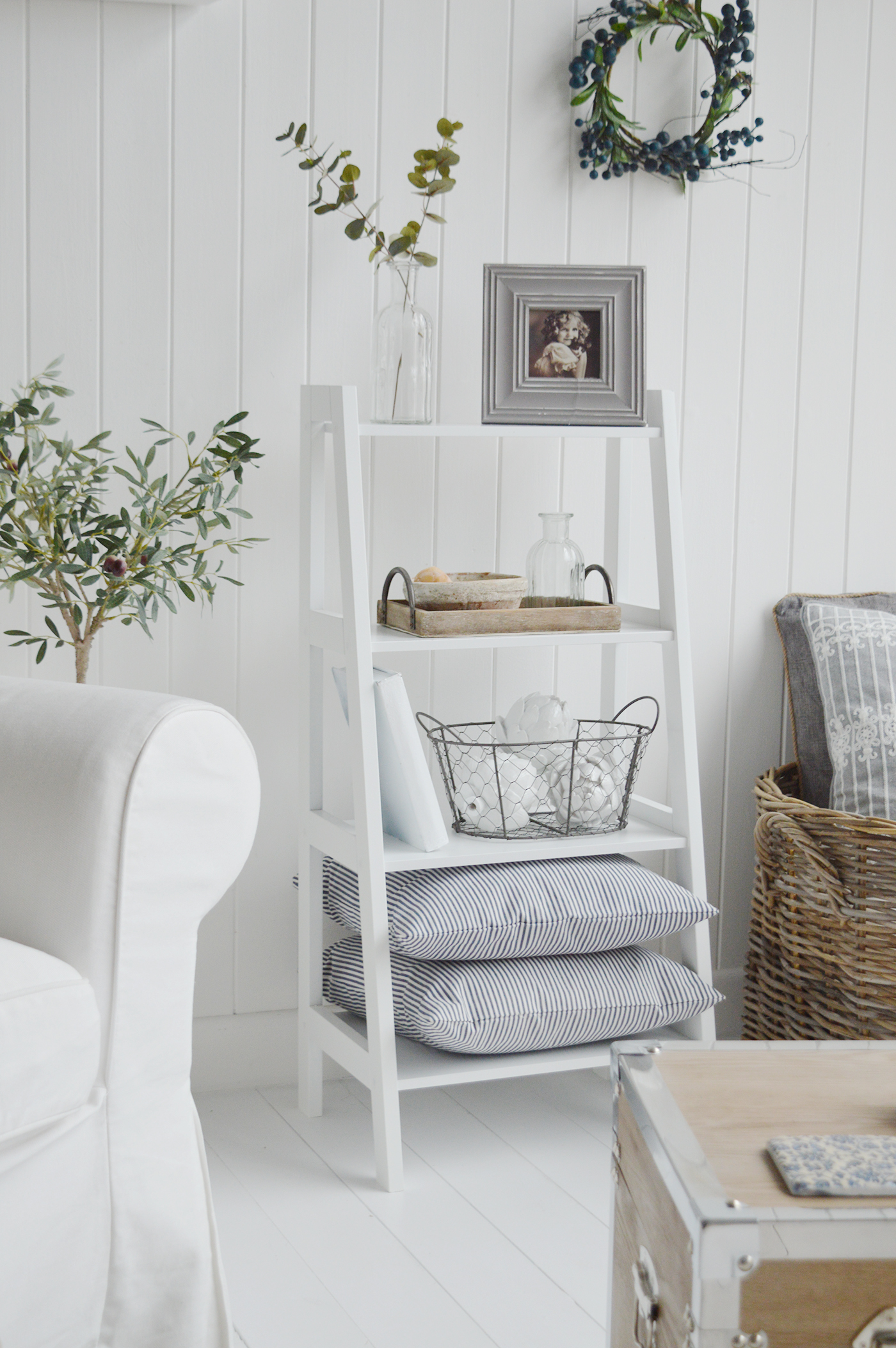 The Patten white shelf unit with four shelves for living room furniture in New England country, coastal and city home interiors