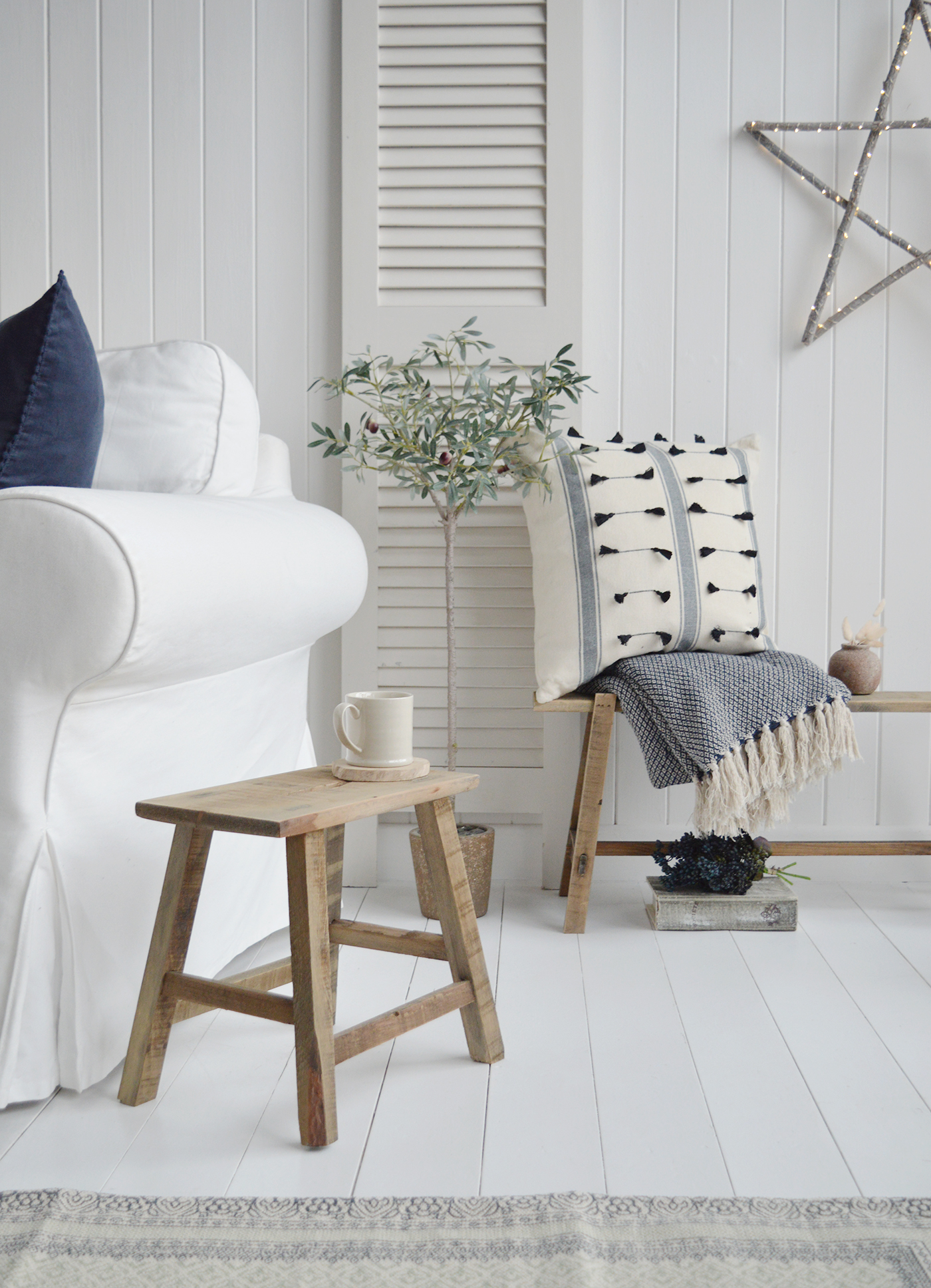 Pawtucket grey rustic milking stool as a side table for New England countyr, farmhouse and country homes and interiors