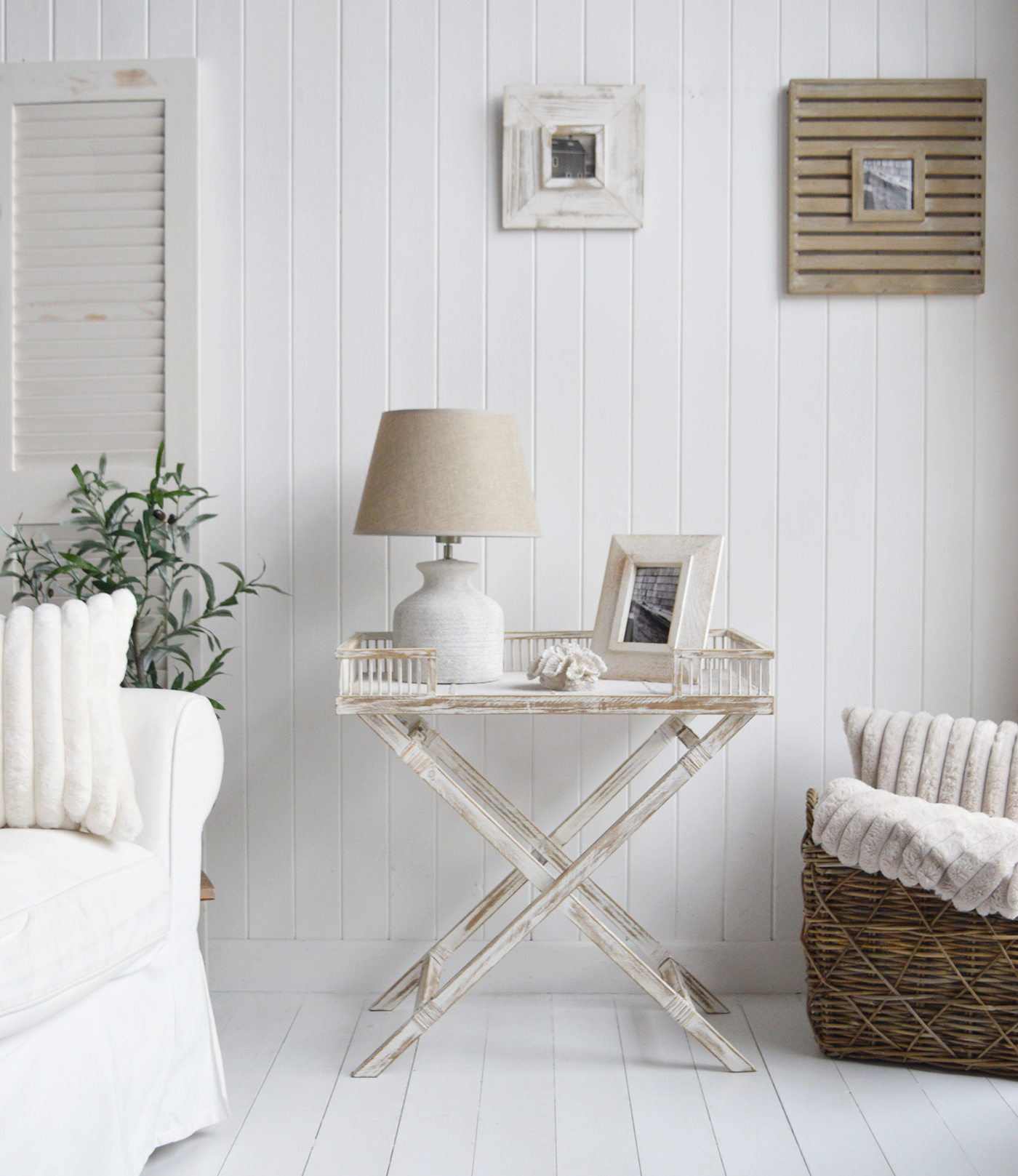 The Provincetown Table, a White wash beach house tray table, and ideal piece of furniture for coastal homes and interiors - shown in a white living room