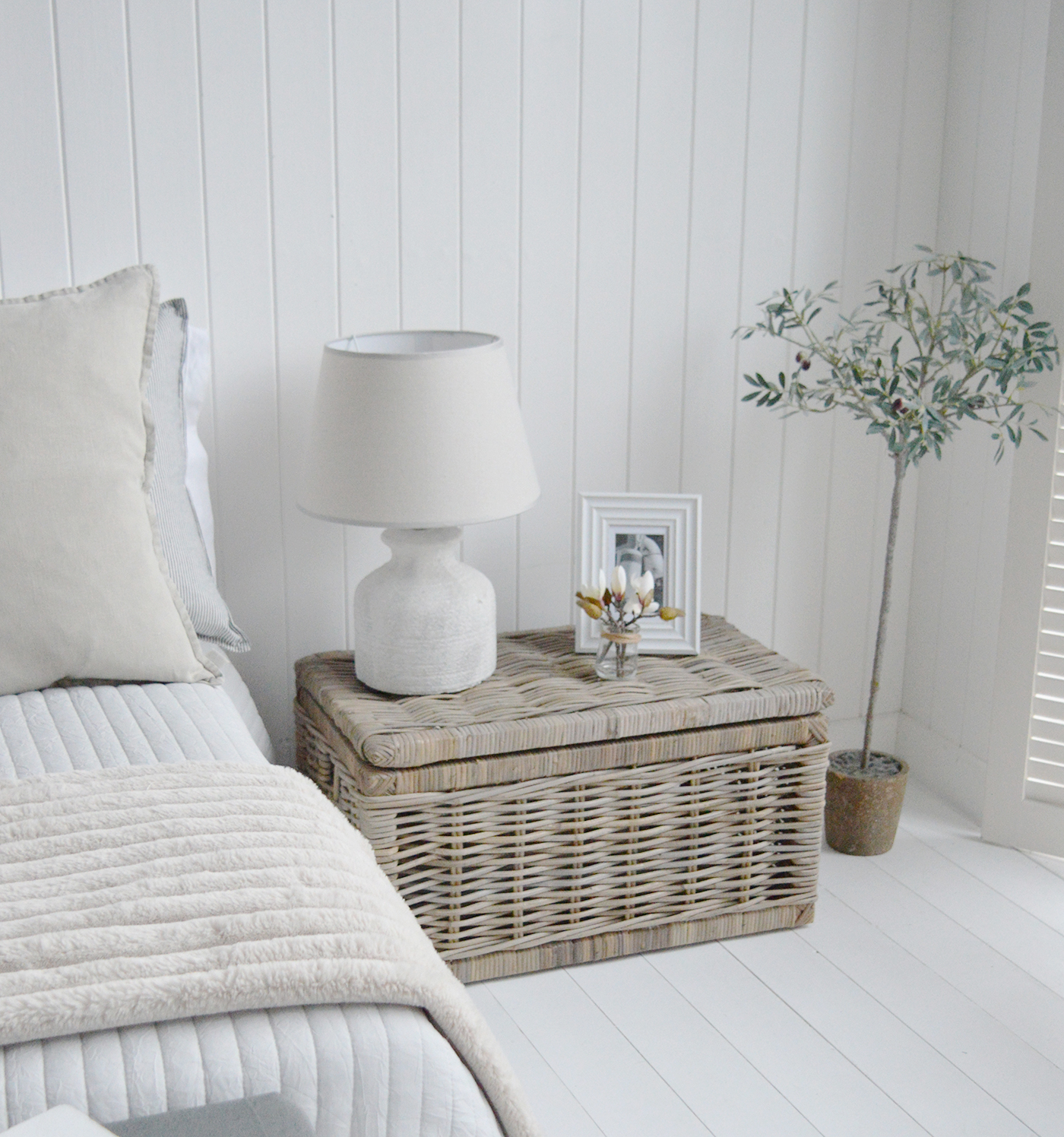 The Seaside basket as a bedside in a modern coastal styled bedroom interior