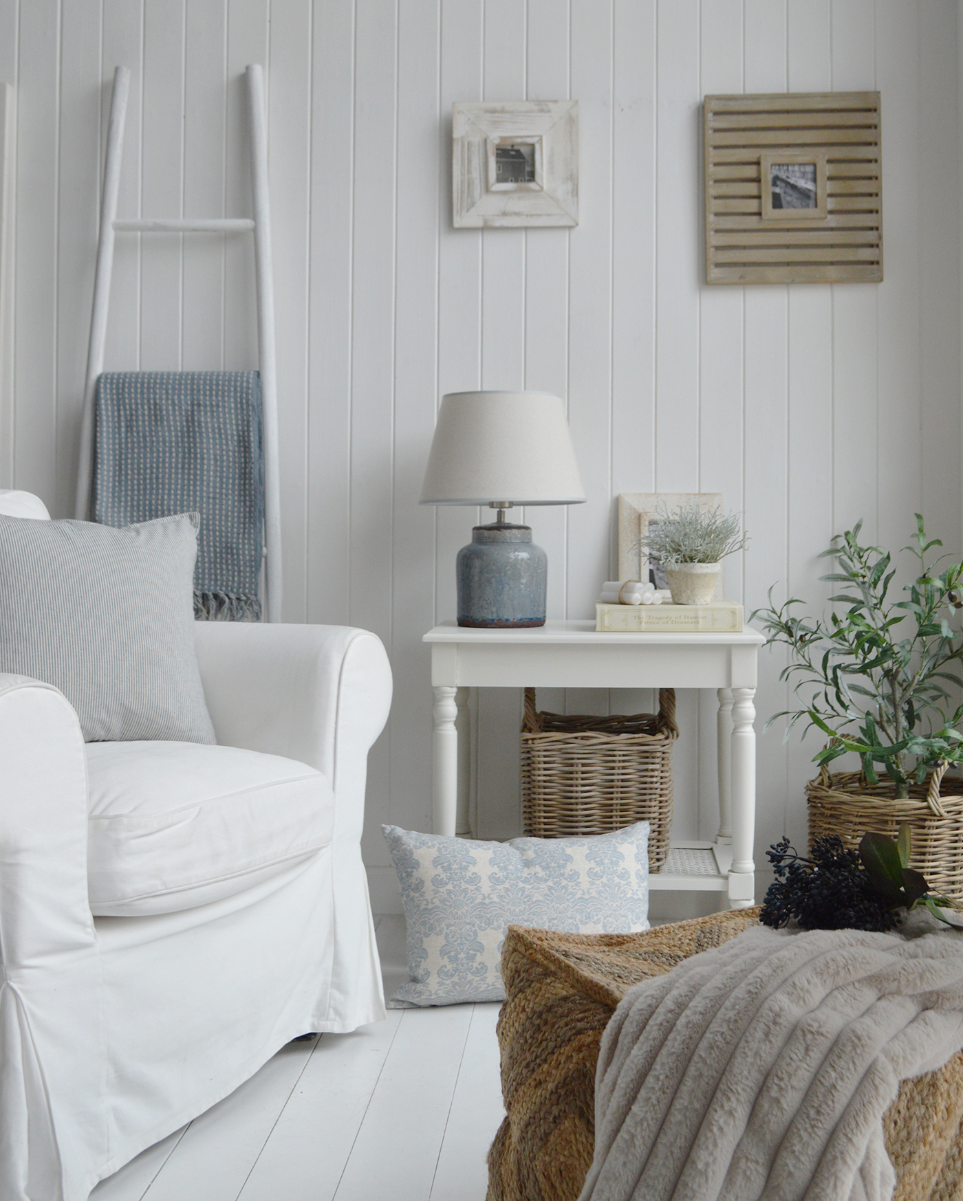 A relaxing coastal living room in blues and whites
