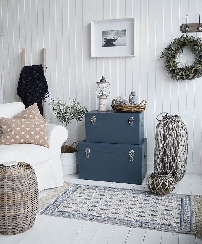 Set of Blue Newbury trunks as a set in the living room, storage furniture and side table for New England country, coastal and city home interiors design