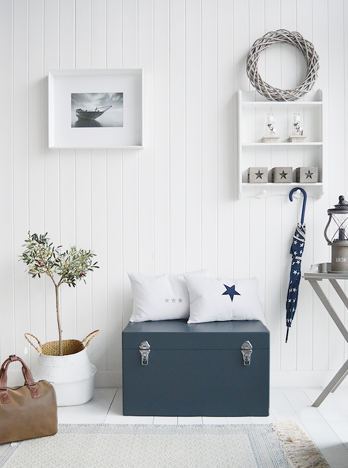 A set of two large different sized Newbury rectangle trunks in a luxurious dark blue grey colour in a matt finish with contrasting silver handles and clasps. The White Lighthouse New England Coastal and Country furniture and interiors. Bathroom, Living Room, Bedroom and Hallway Furniture for beautiful homes