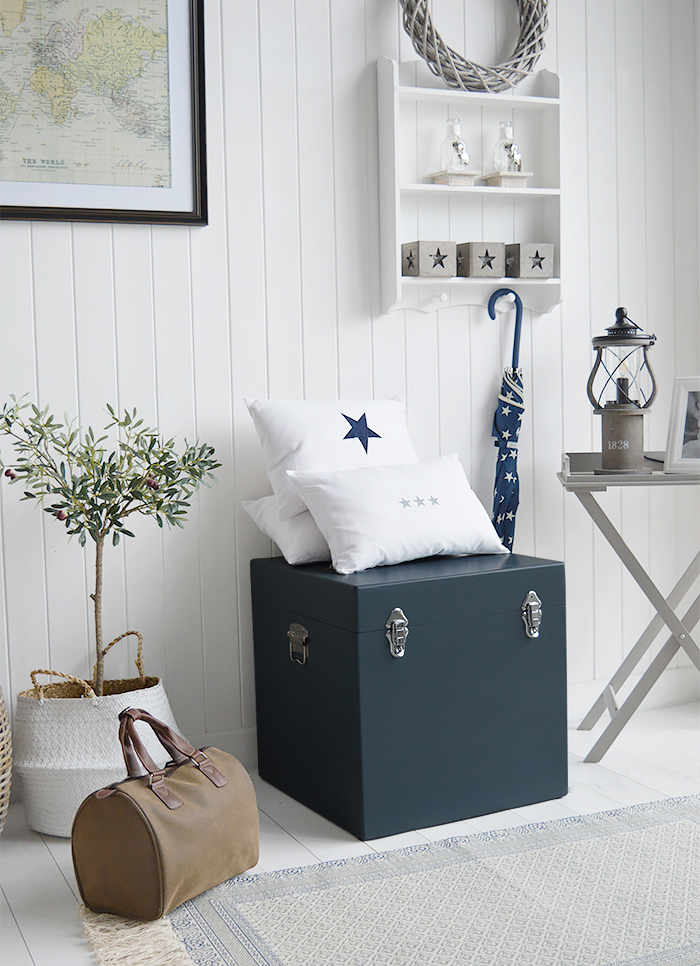 A set of two large different sized Newbury square trunks in a luxurious dark blue grey colour in a matt finish with contrasting silver handles and clasps. The White Lighthouse New England Coastal and Country furniture and interiors. Bathroom, Living Room, Bedroom and Hallway Furniture for beautiful homes