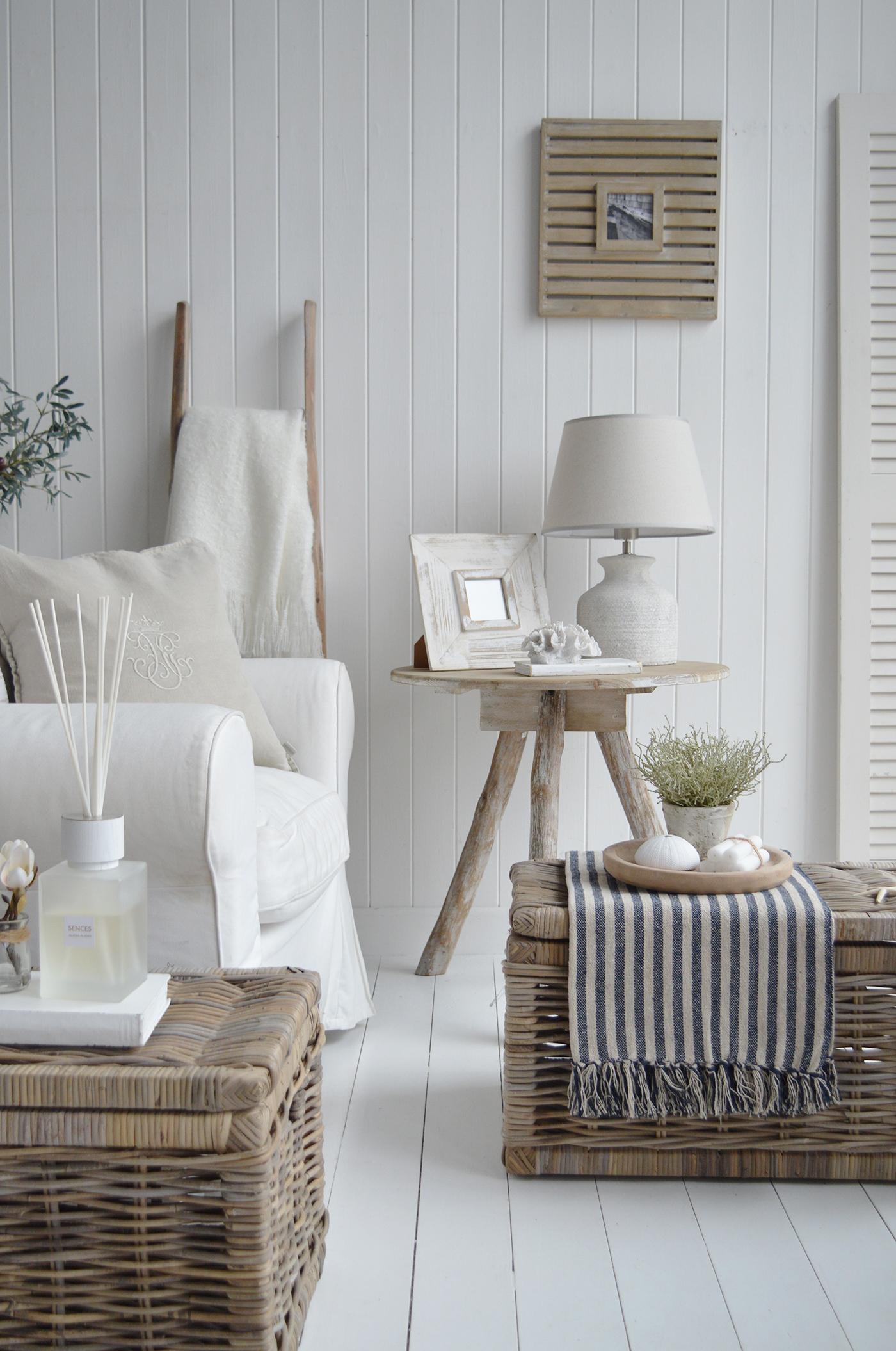 The Driftwood table in a modern farmhouse living room setting, a beautiful piece of furniture with a rustic finish