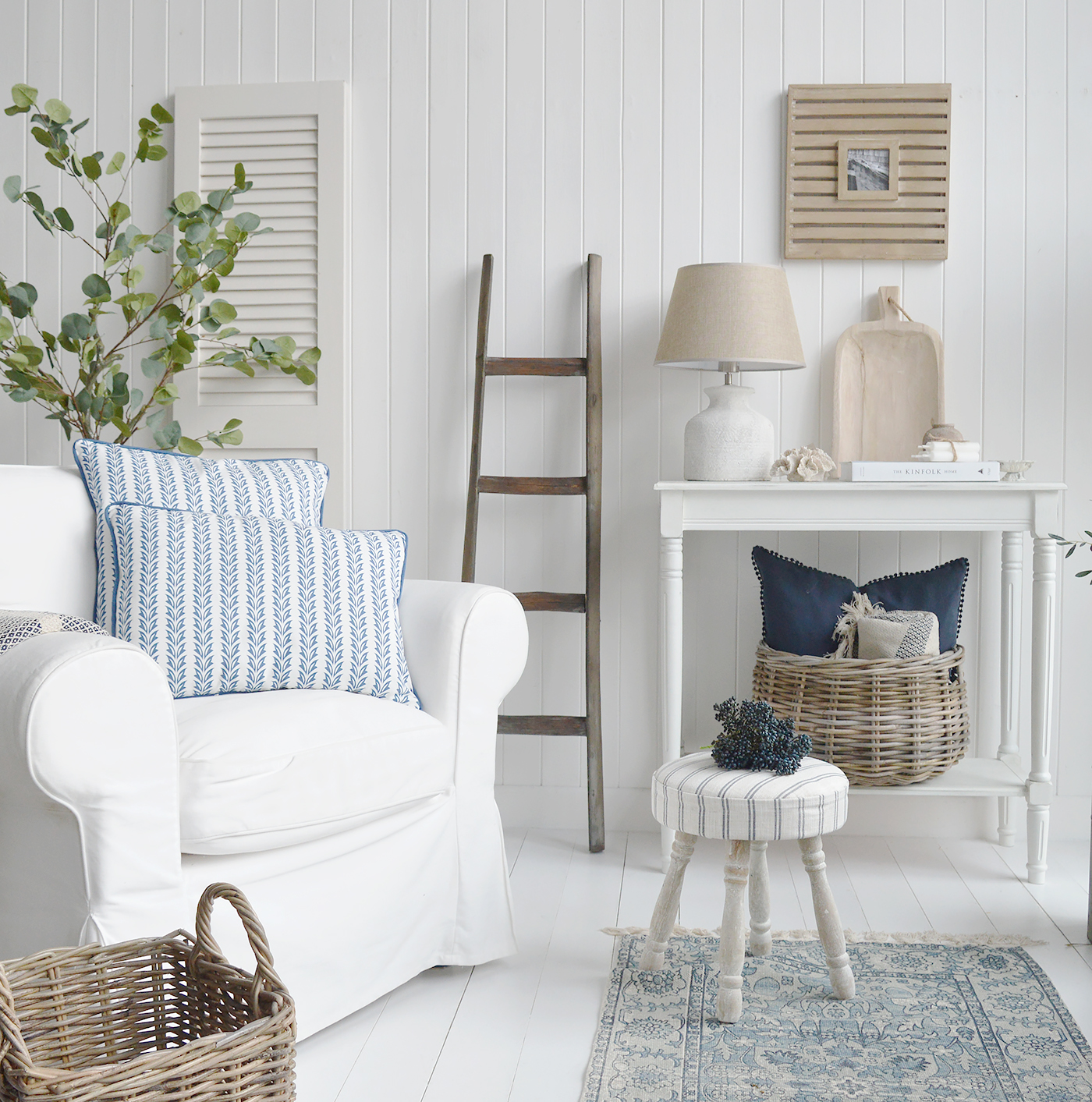 New England countyr, farmhouse and coastal furniture and interiors. Showing driftwood blanket ladder, Long Island footstool, Falmouth cushions, artificial Eucalyptus tree Barnstead lamd and home decor accessories.