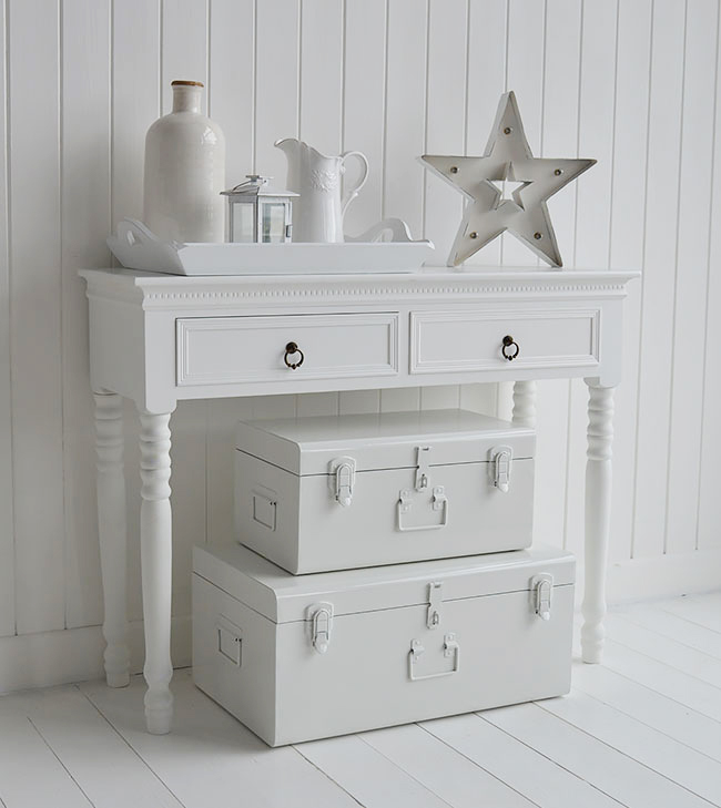 Nantucket white vintage trunk suitcases in hallway