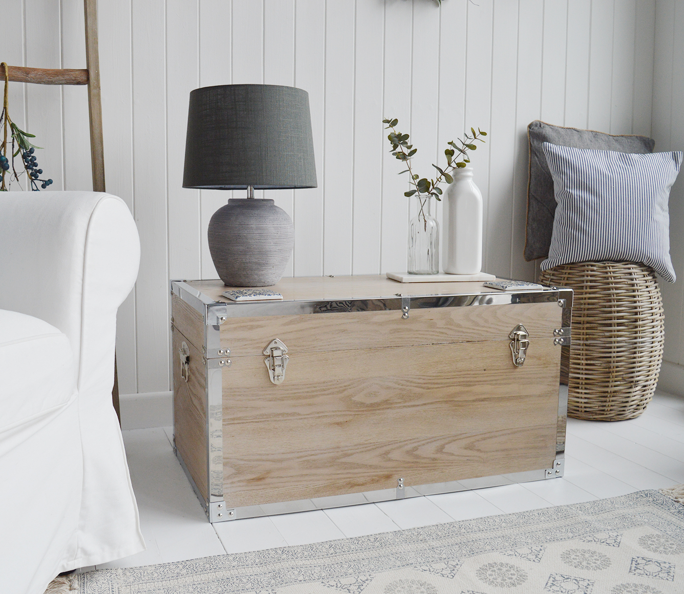 Vermont white washed storage trunks from The White Lighthouse. New England style furniture for coastal, country, farmhouse, cottage and city homes and interiors. Living Room, hallway and bedroom storage furniture