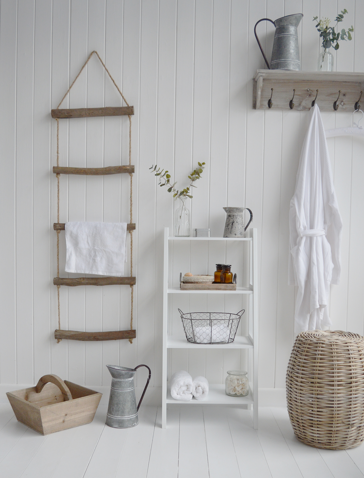 A rope towel ladder to hang towels in bathroom or blanket ladder for the living room. from The White Lighthouse Furniture , New England interiors and furniture for the hallway, living room, bedroom and bathroom