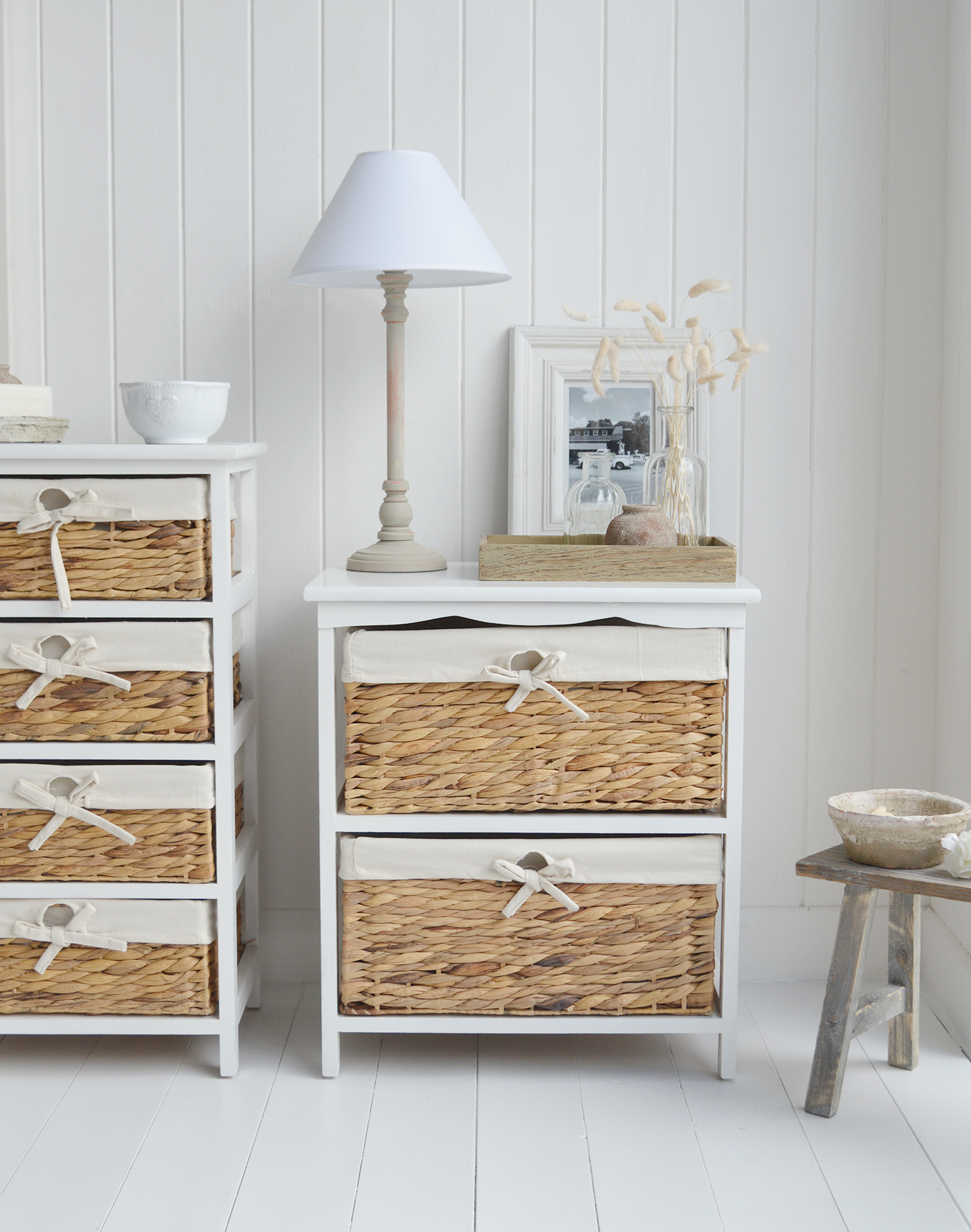 bathroom furniture. A wide white bathroom cabinet with two basket drawers for New England Country, coastal, modern farmhouse furniture and interiors, can be used as a white lamp table from The Bar Harbor range