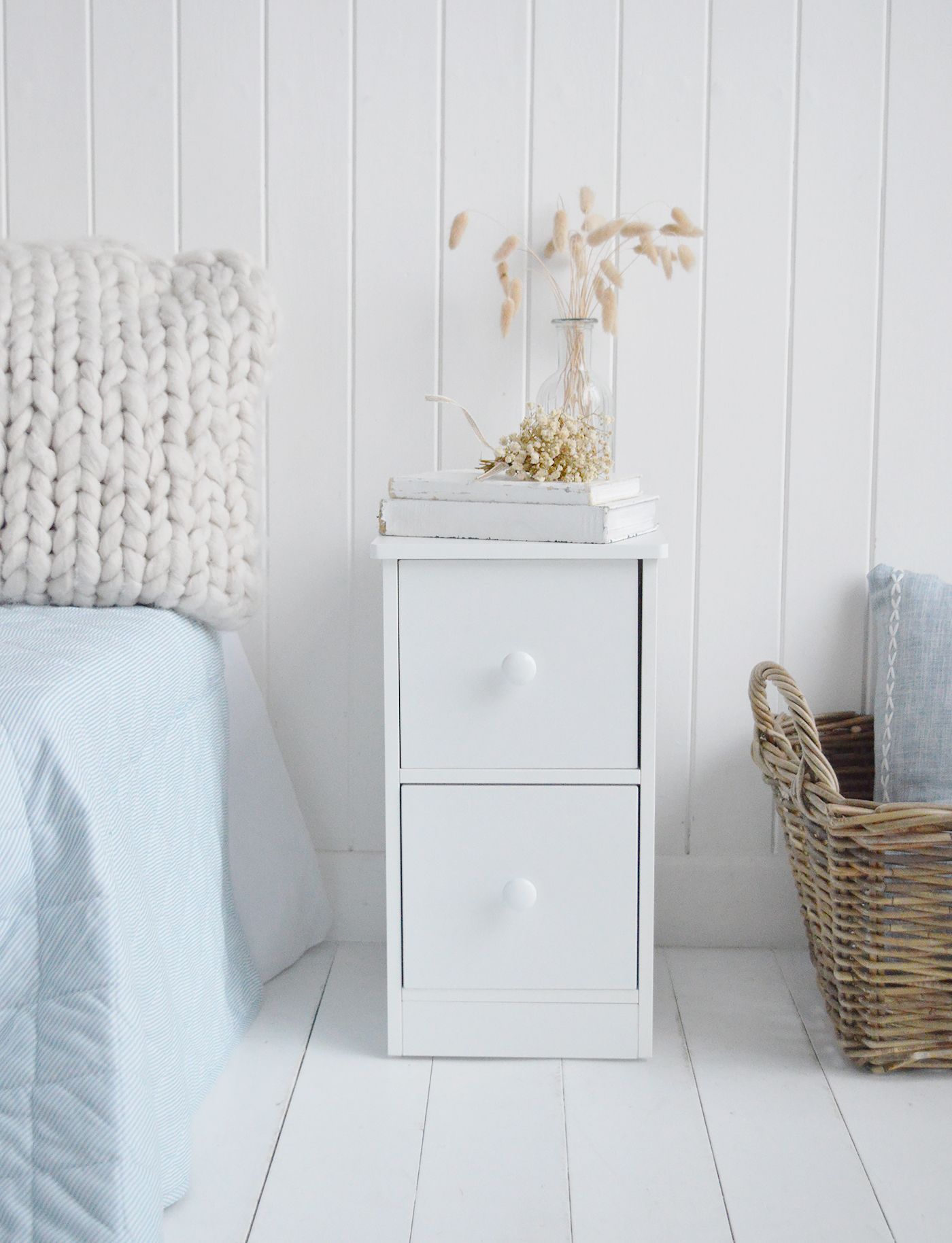 	The soft white finish suits coastal, New England and neutral bedroom interiors.