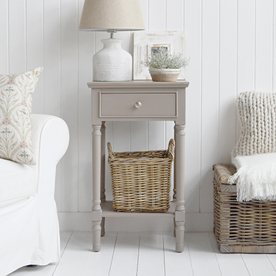 The White Lighthouse bedroom furniture. A narrow white bedside table with drawer and silver handle, can be used as a white lamp table from The Georgetown range