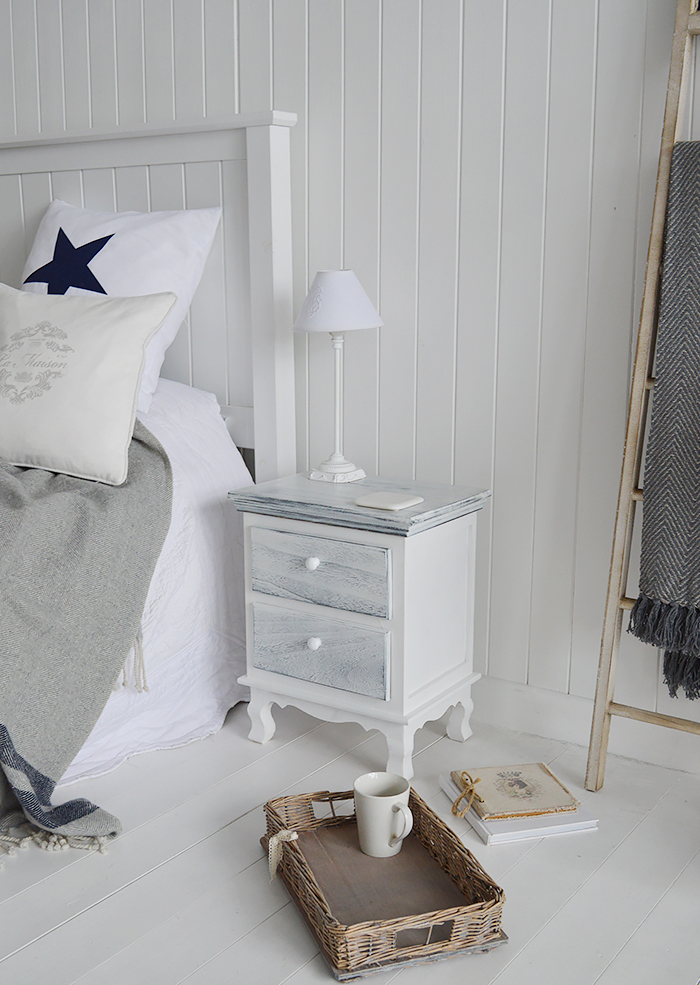 Slightly distressed furniture works best for coastal interiors, to resemble weathern worn wood beaten by the endless waves. The Shoreham bedside cabine in blue and white hues with a distressed finish