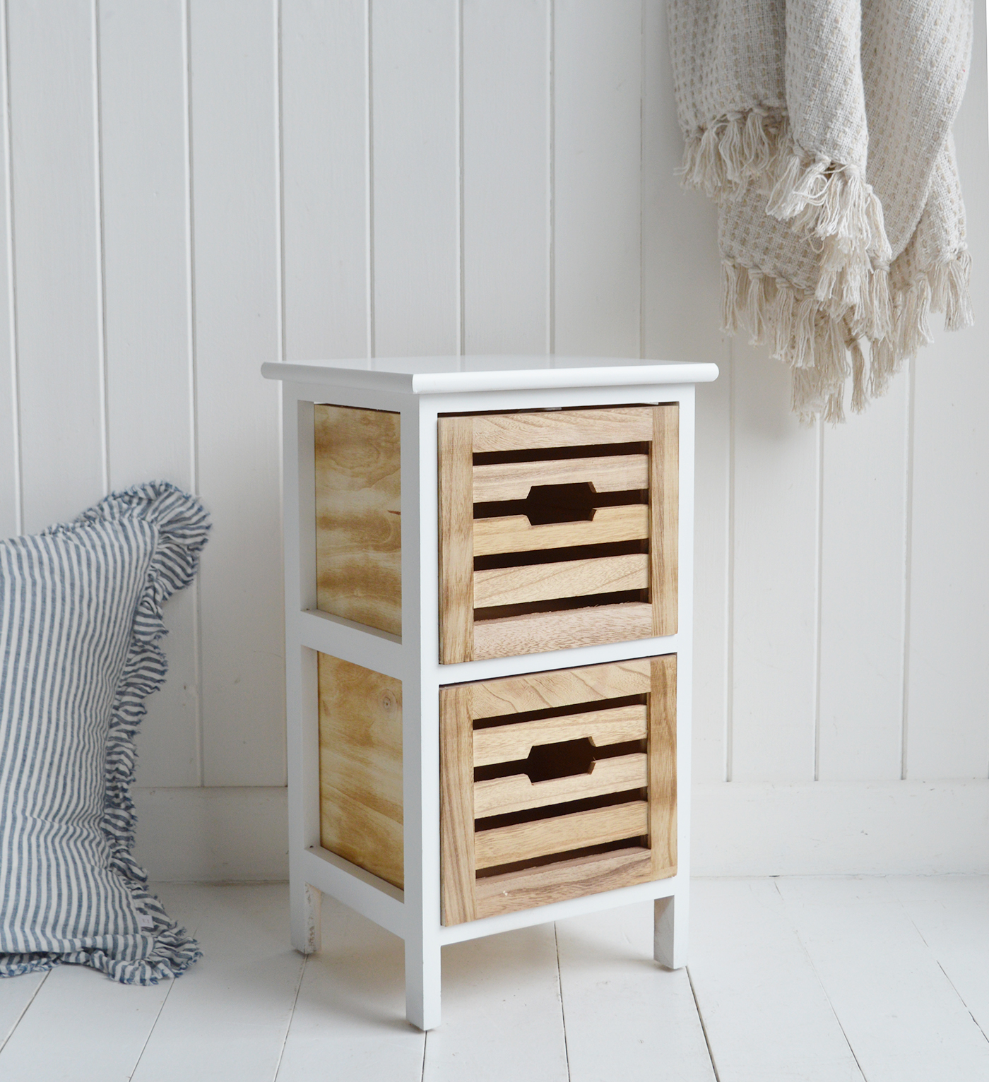 Northport slim bedside table positioned beside bed with natural textures and soft neutral decor