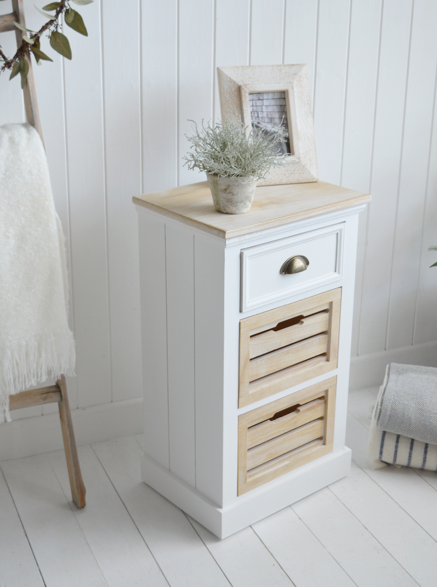 The Southport white bedside cabinet with 3 drawers for a coastal bedroom