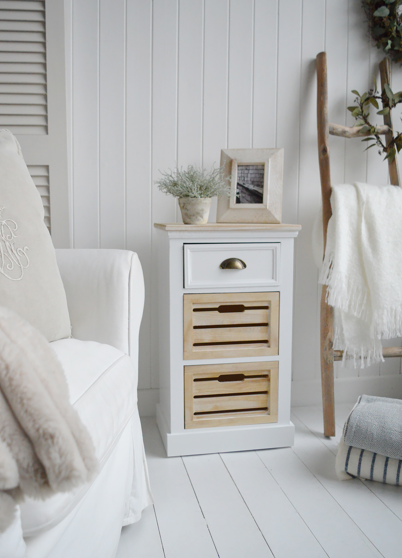 The Southport cabinet lamp table in a coastal living room