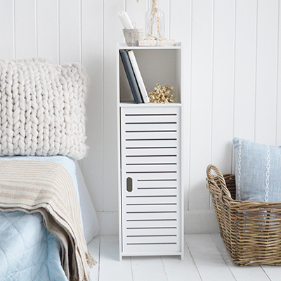 Designed to suit modern coastal and neutral interiors, the Alden narrow bedside cabinet at 22cm wide, combines concealed storage with open display shelving.