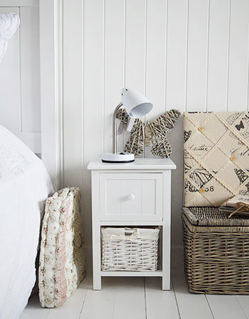 A small narrow bedside table with a lined basket drawer and a wooden drawer with knob and tongue and groove style frontage.

Ideal for small narrow spaces or childrens bedrooms.