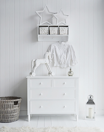 Idea for a hall table is chest of white drawers