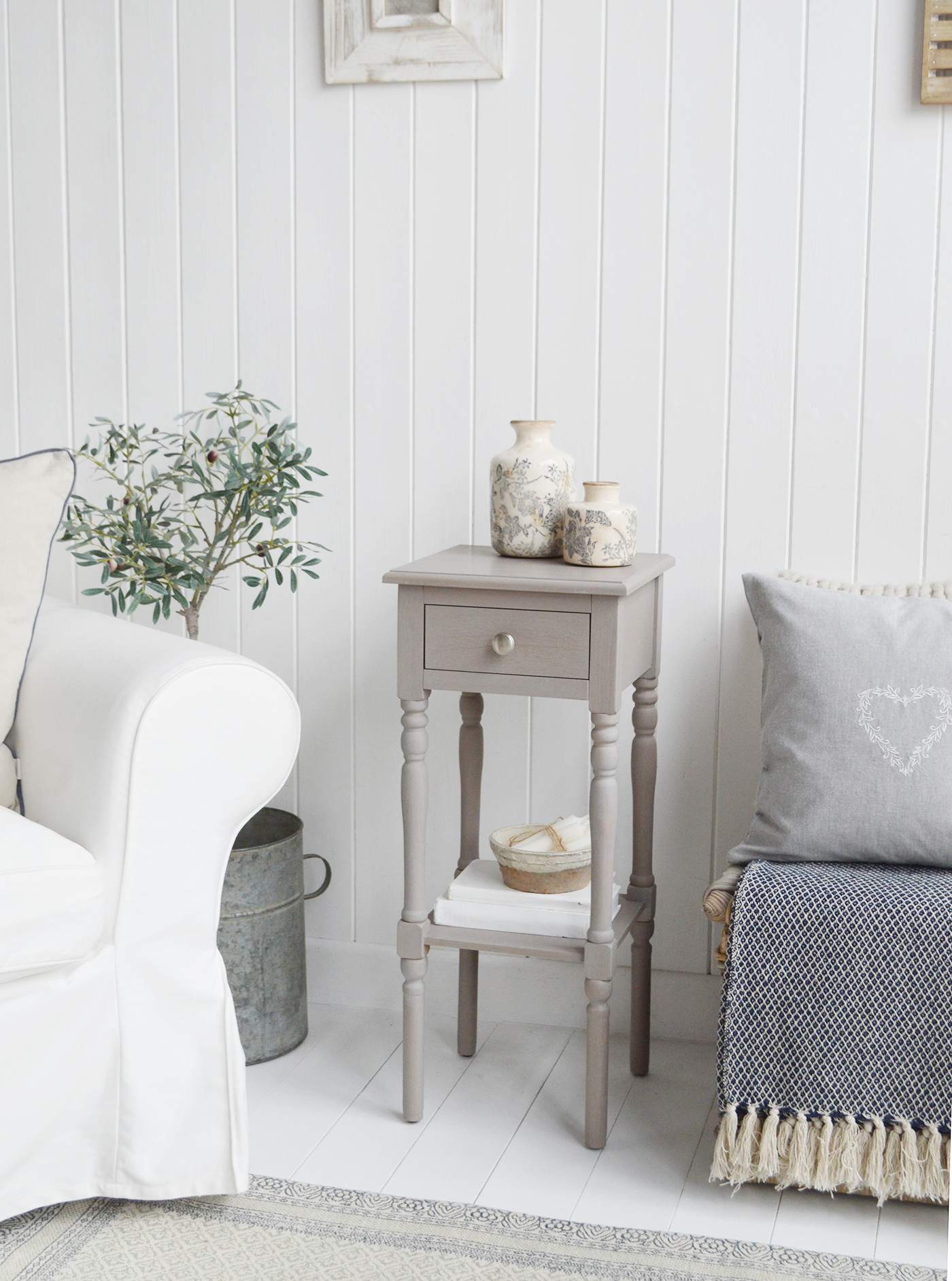 A large and narrow vintage grey lamp table with drawer and silver handle, ideal as bedside or in the living room of New England style coastal, country, beach house, Hamptons or modern Farmhouse styled home and interio