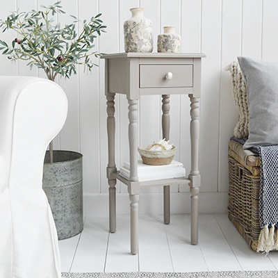 The White Lighthouse farmhouse and country furniture for neutral decors furniture. A narrow white bedside table with drawer and silver handle, can be used as a white lamp table from The Georgetown range