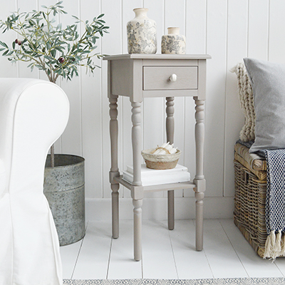 The White Lighthouse bedroom furniture. A narrow white bedside table with drawer and silver handle, can be used as a white lamp table from The Georgetown range