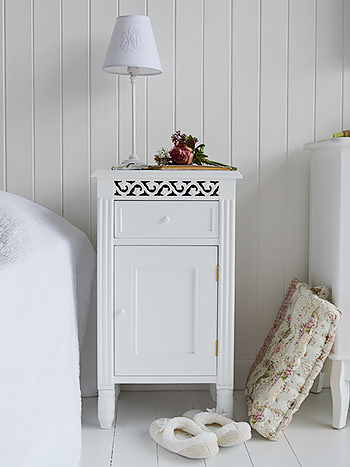 White bedside table with cupboard and drawer