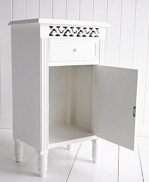 White bedside cabinet shown with the door open