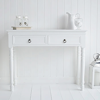 Scandinavian white dressing table in bedroom with drawers